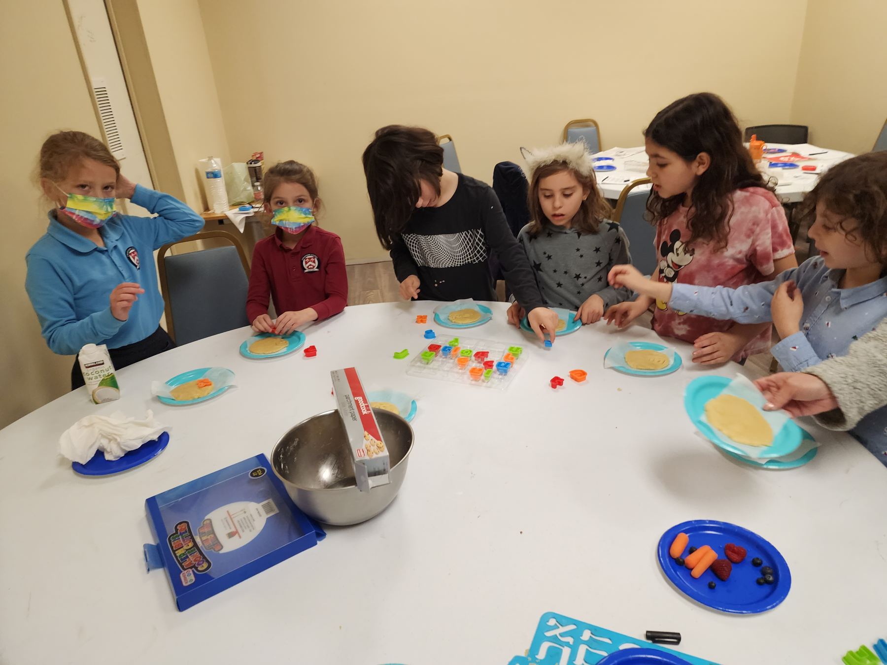 Children baking at the table