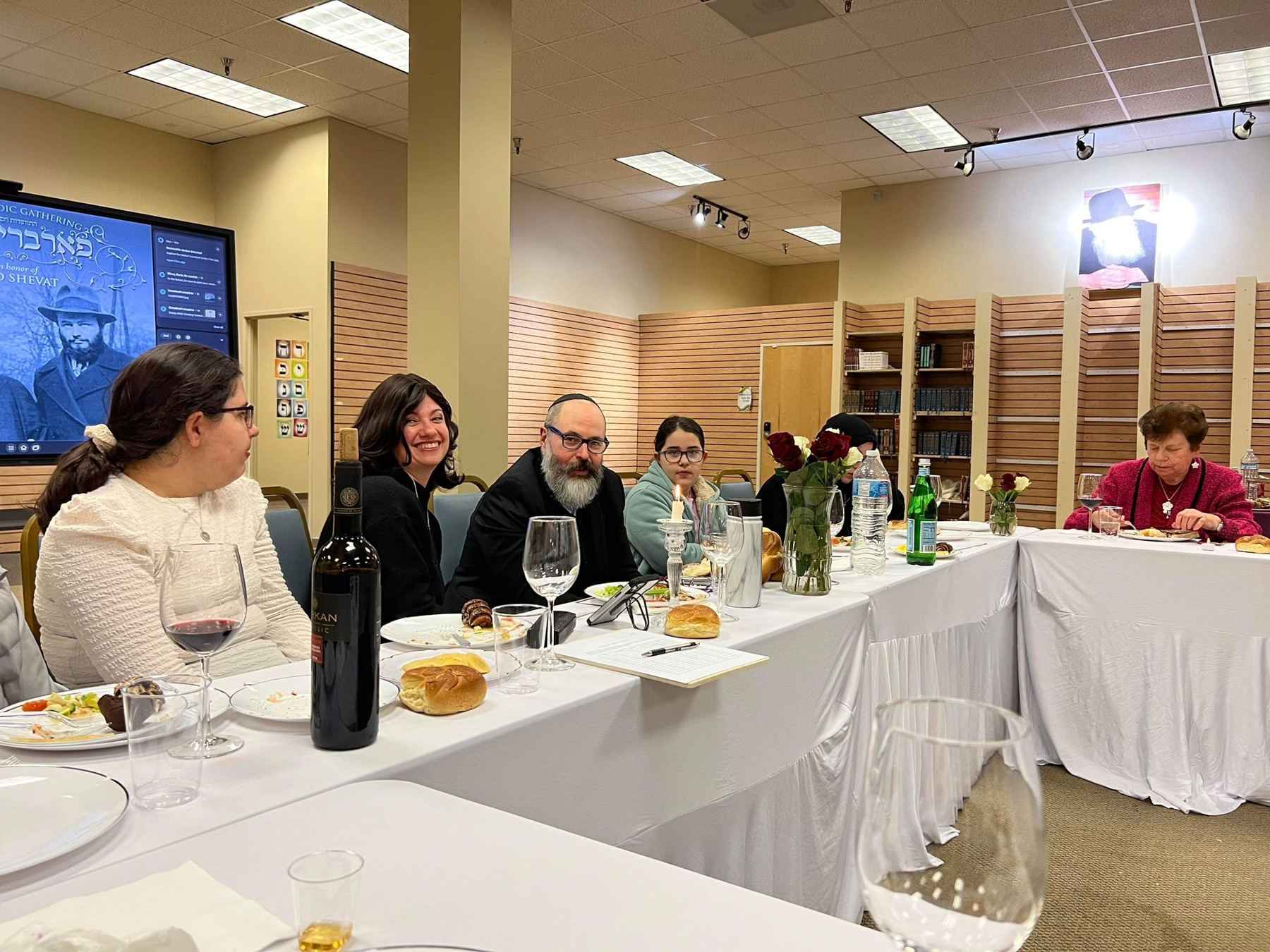 Around the long table at the chabad house