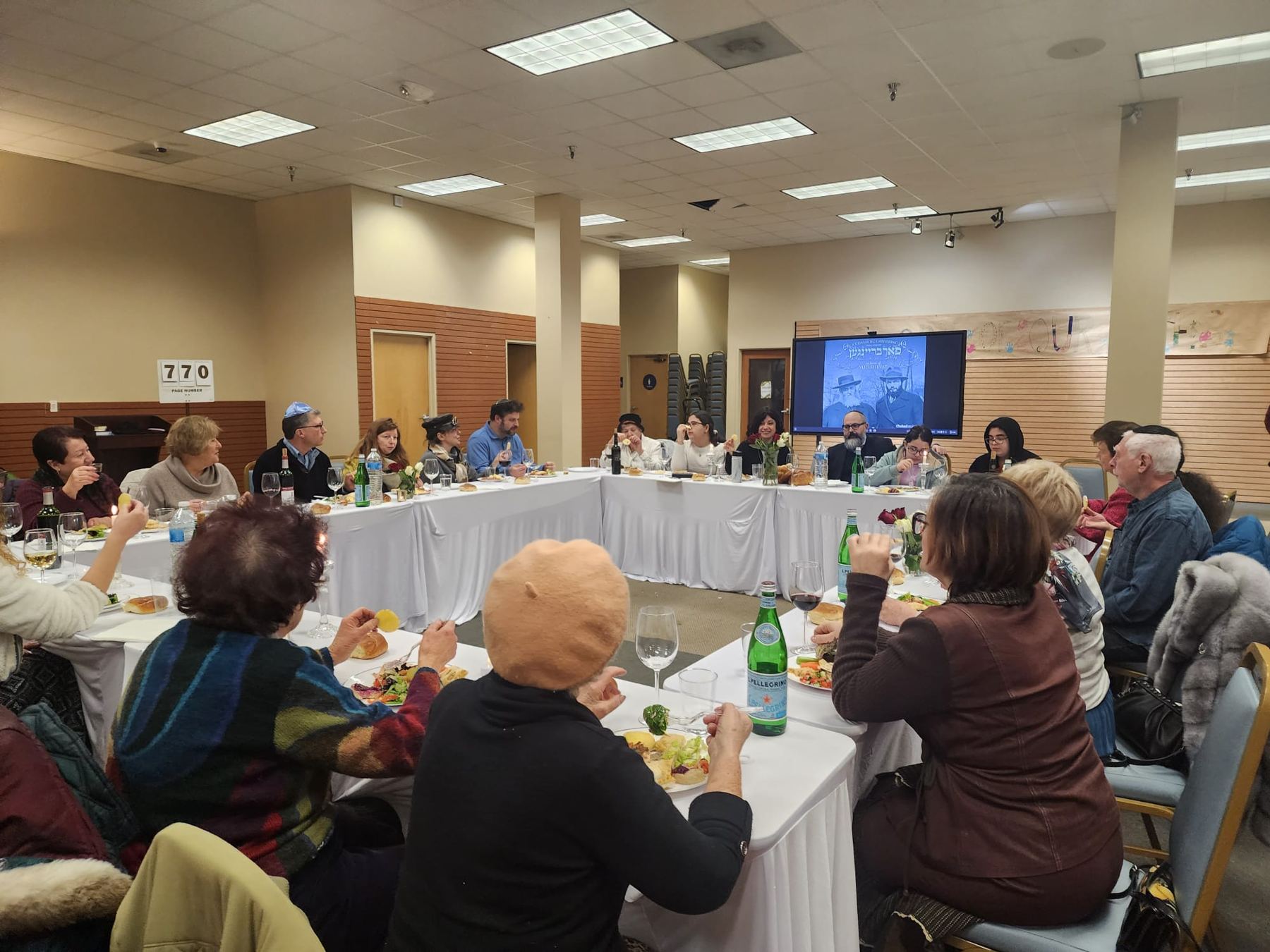 Community gathered around the tables