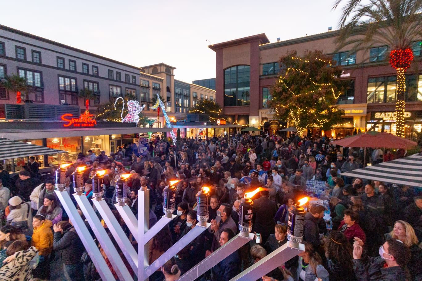 Giant menorah lighting with the whole community