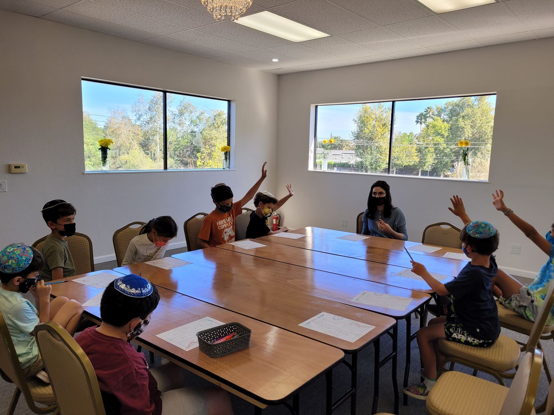 Class raising hands