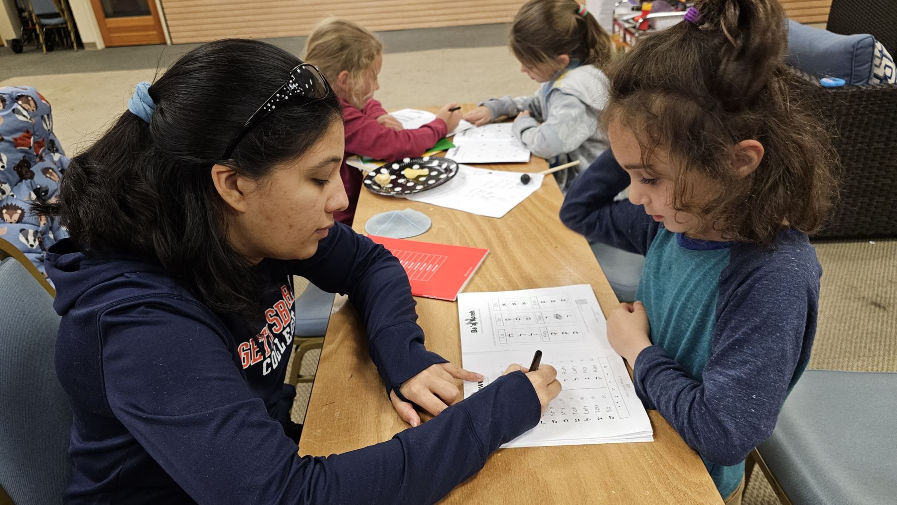 Girls practicing writing