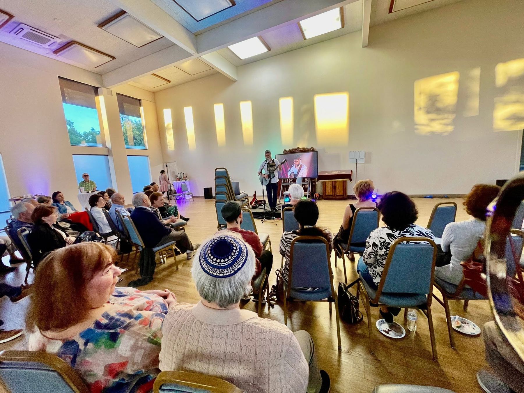 Community seated for a program