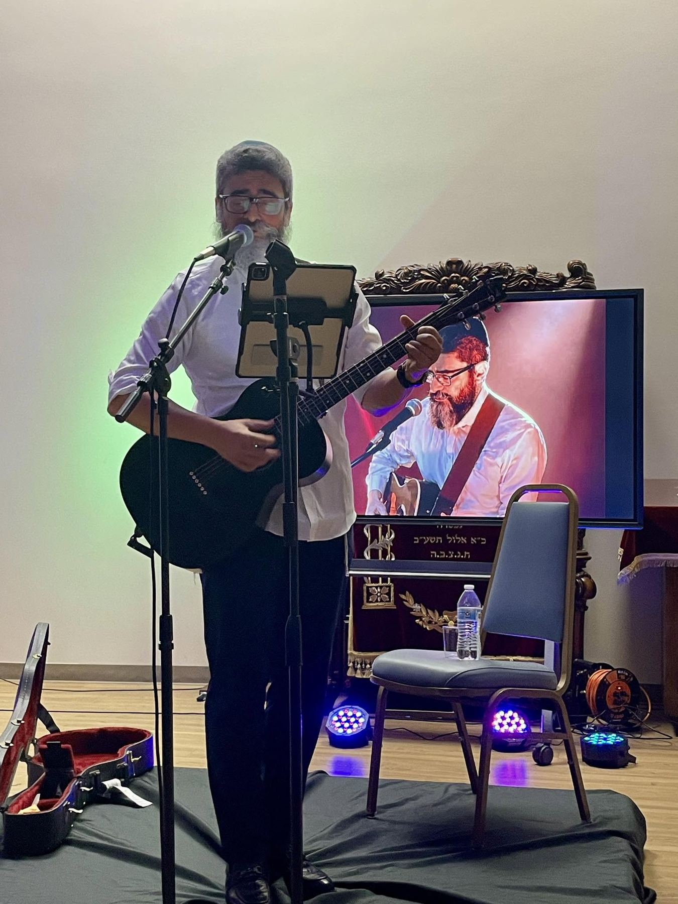 Musician leading an evening program